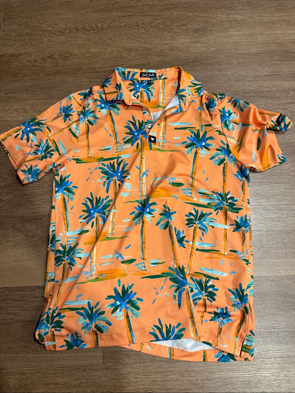 Bad Birdie Orange Polo with Teal and Blue Palm Print